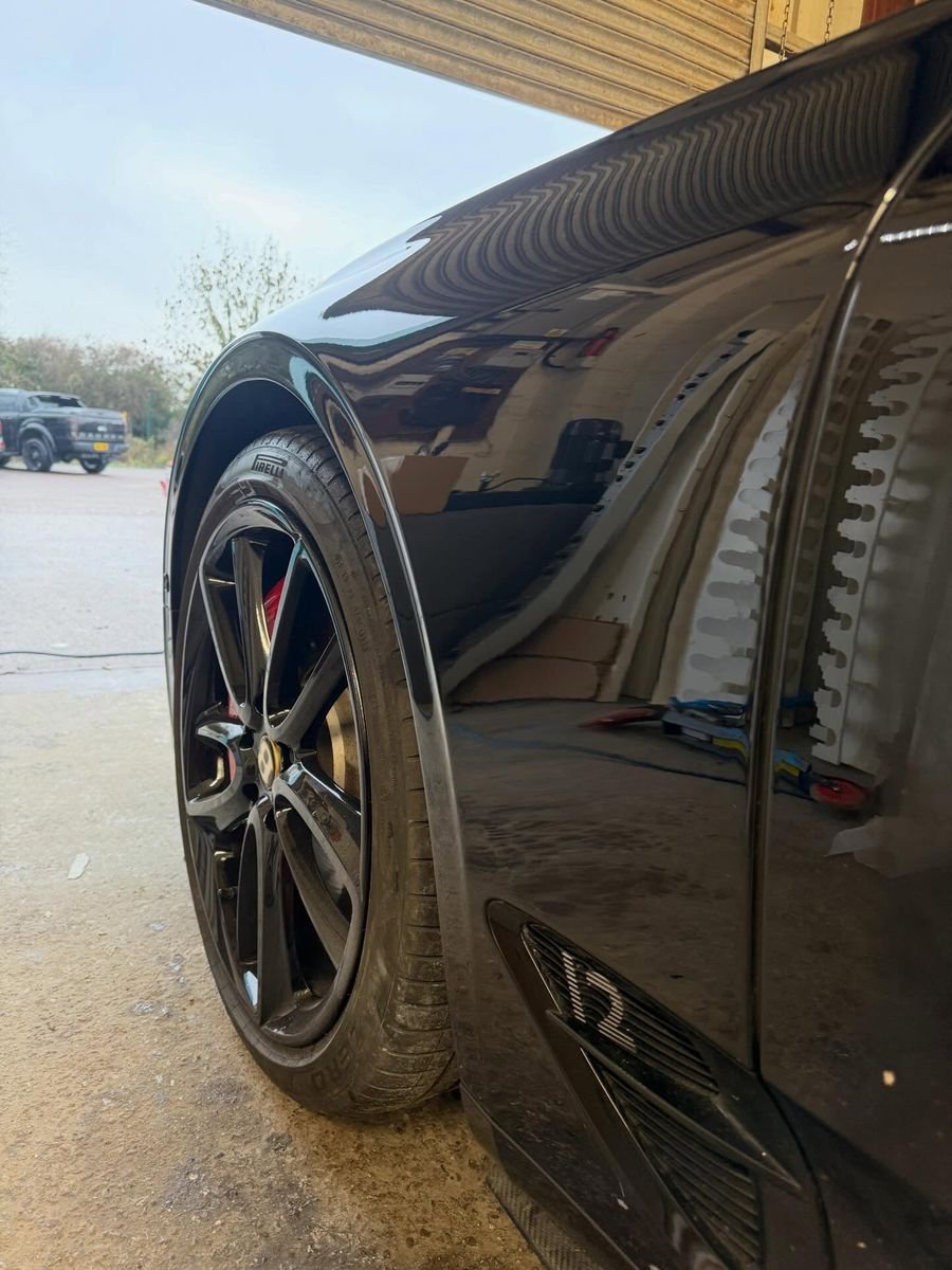 Glossy black wing and wheel arch, Triple R Paintworx